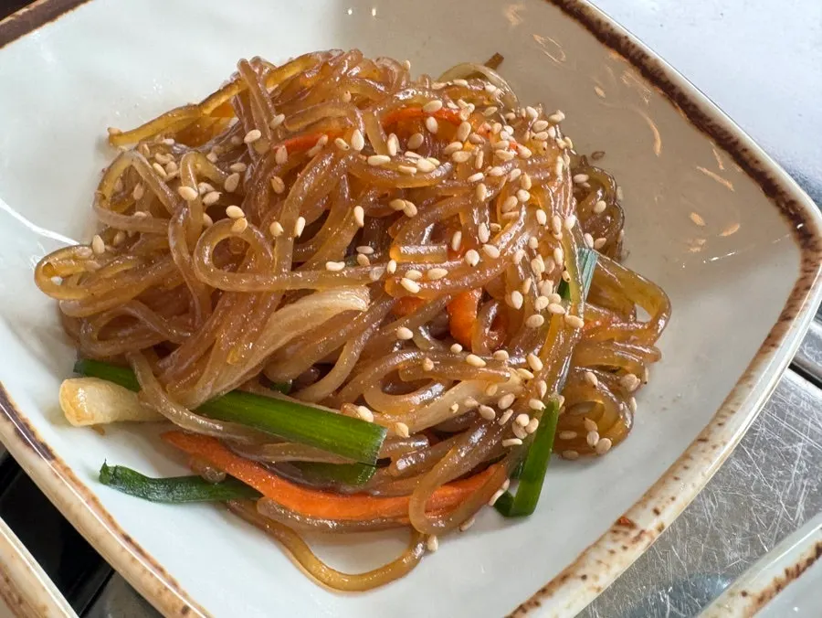 A meal of sotbap paired with side dishes