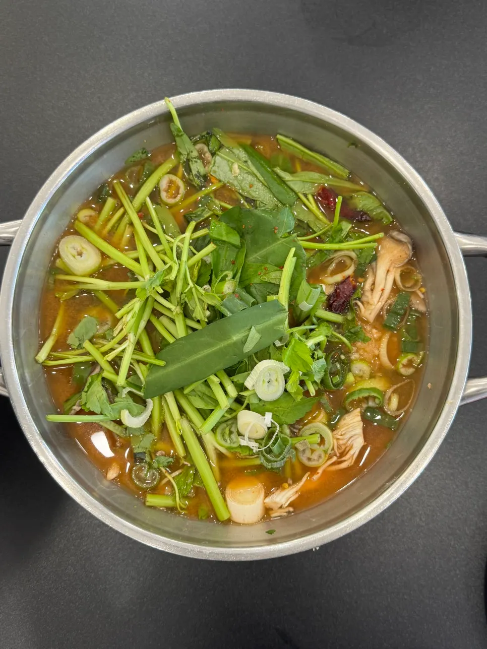 Pot of spicy red broth shabu-kalguksu