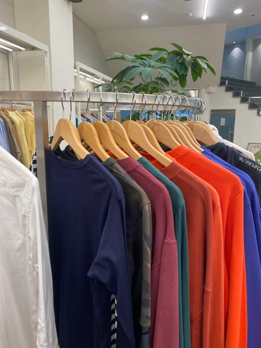 Clothing section with shirts and jackets on display