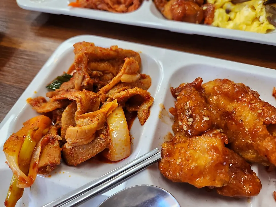A full buffet spread of rice and side dishes together