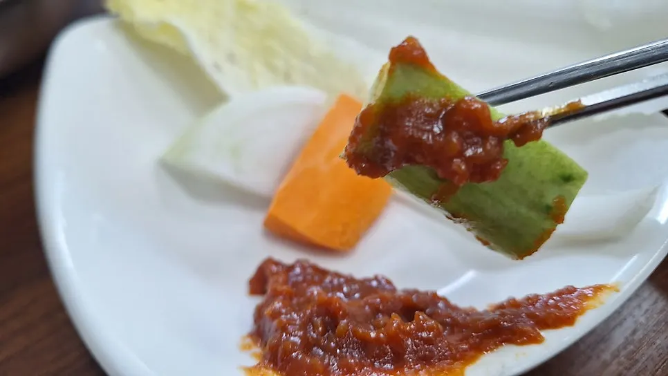 Close-up of a plate with namul and japchae