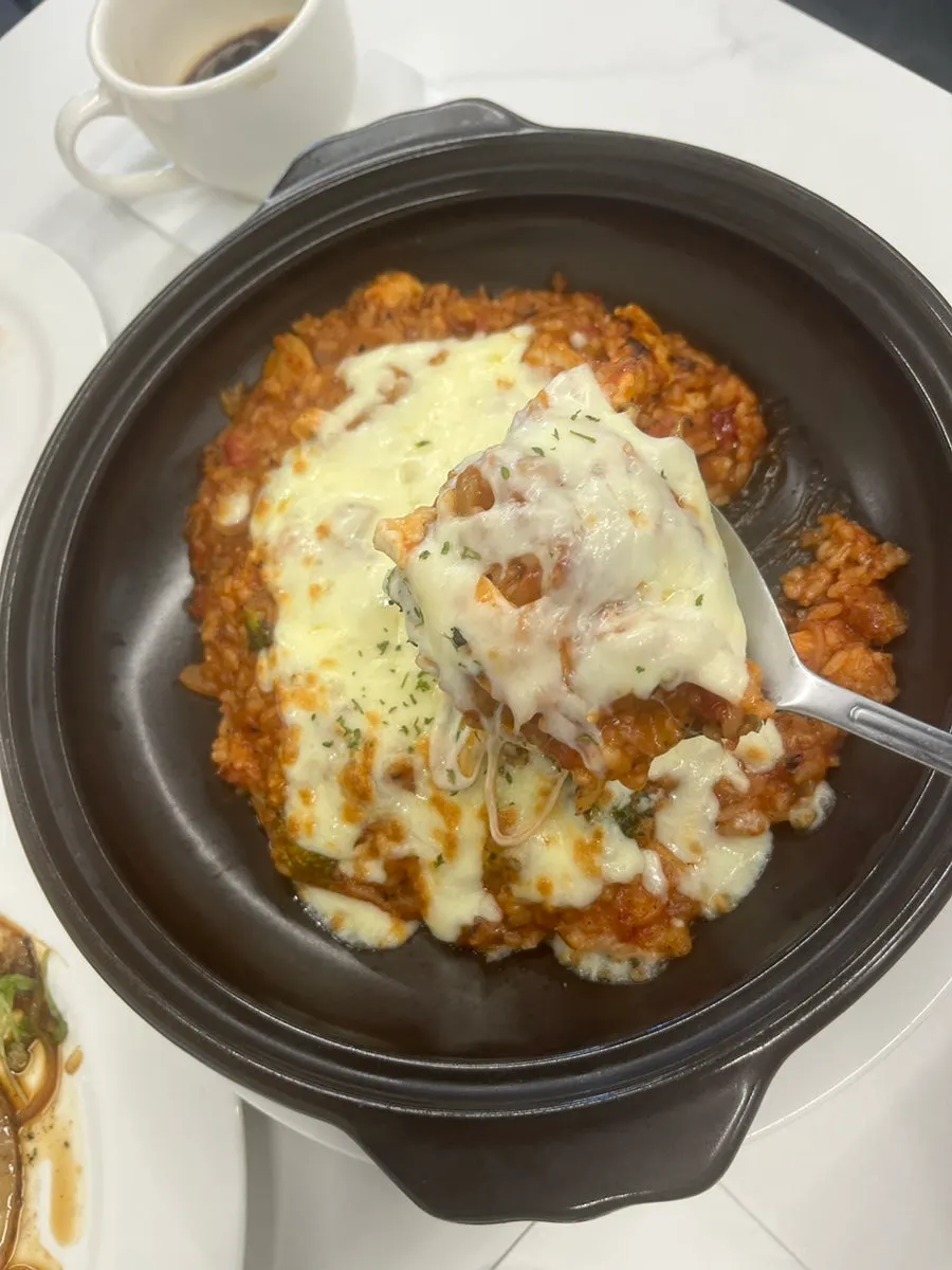 A generous spoonful of tomato cheese risotto