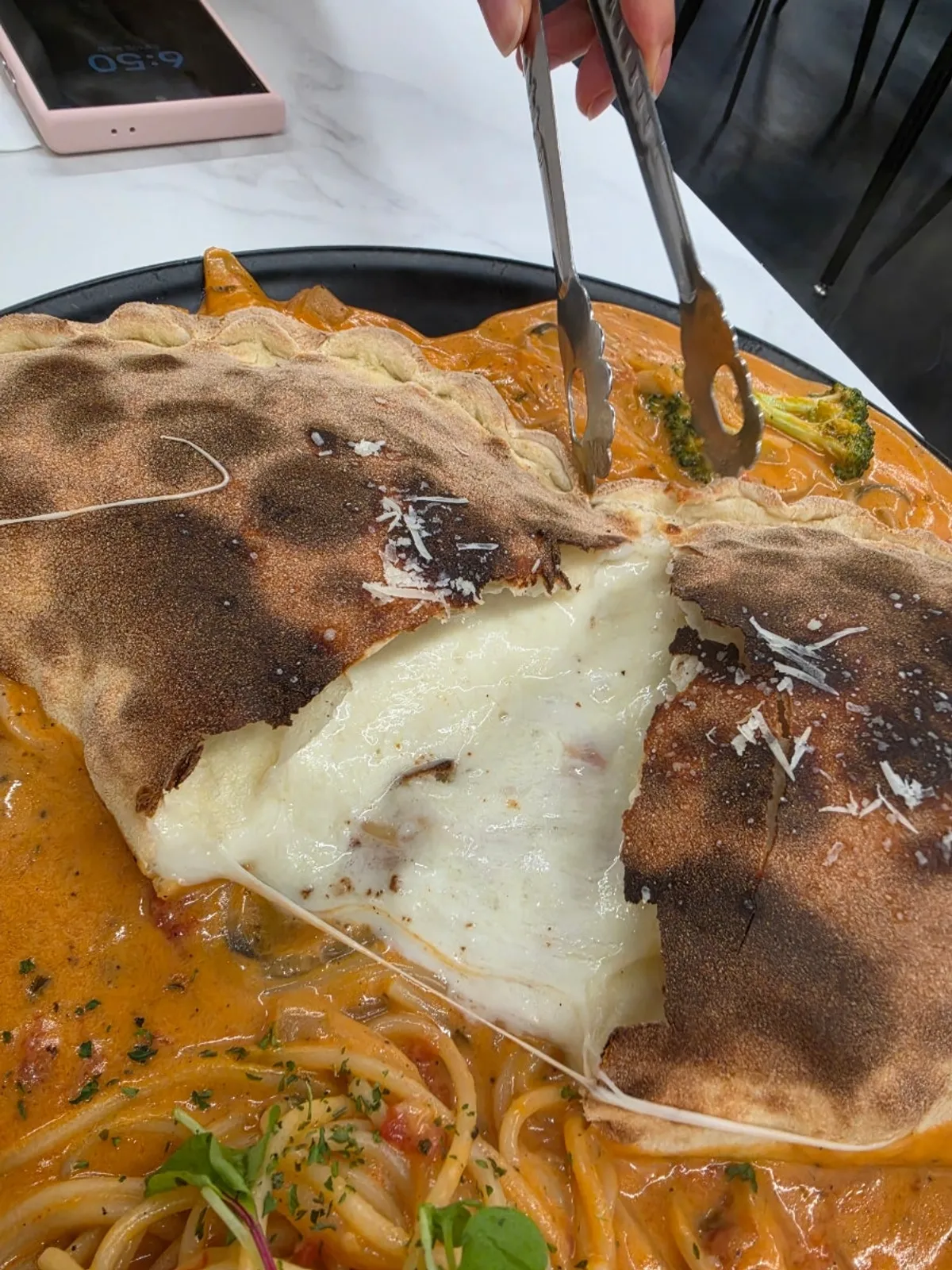 Rose bacon calzone with stretching cheese
