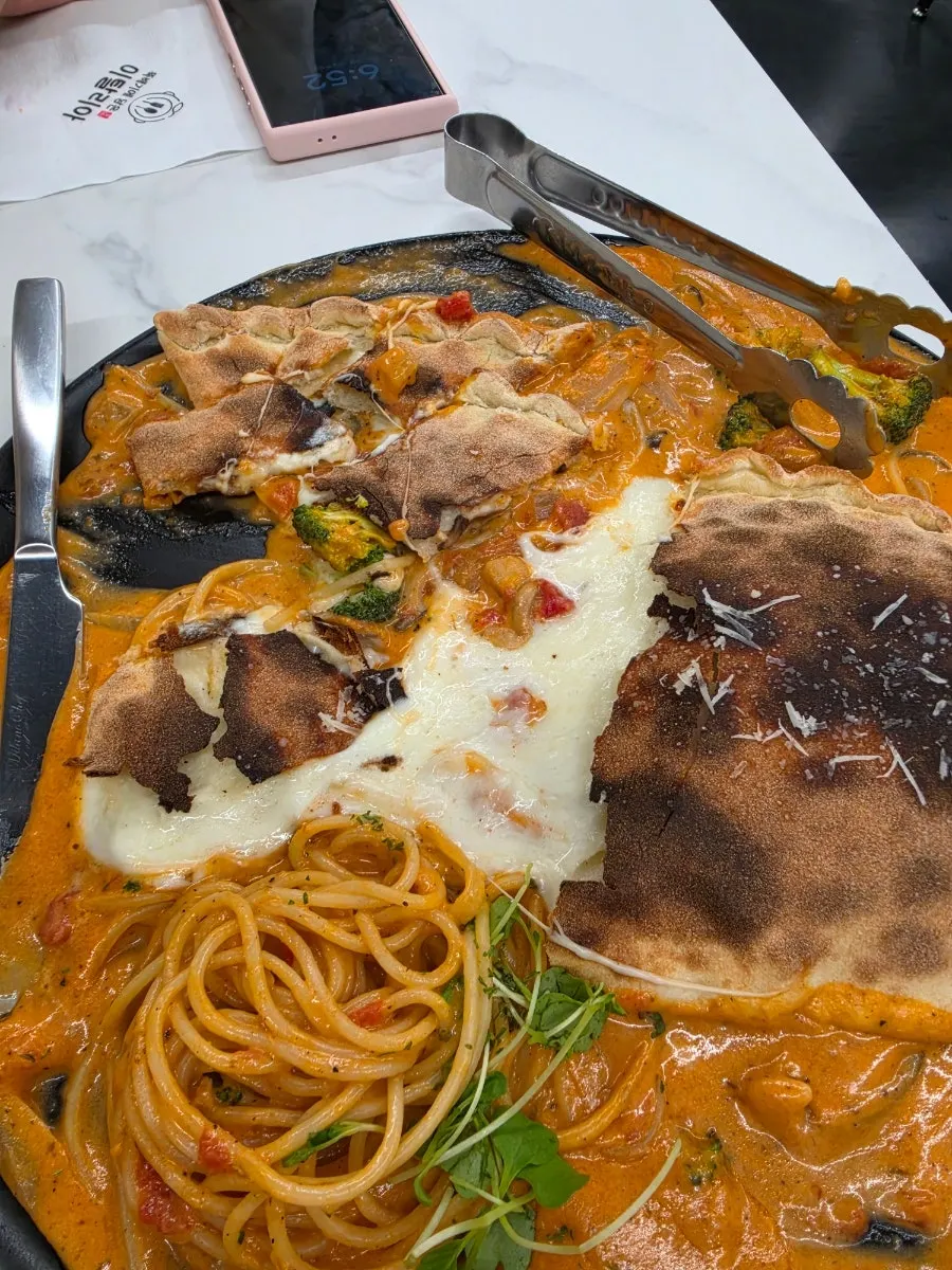 Ppesce and rose bacon calzone meal