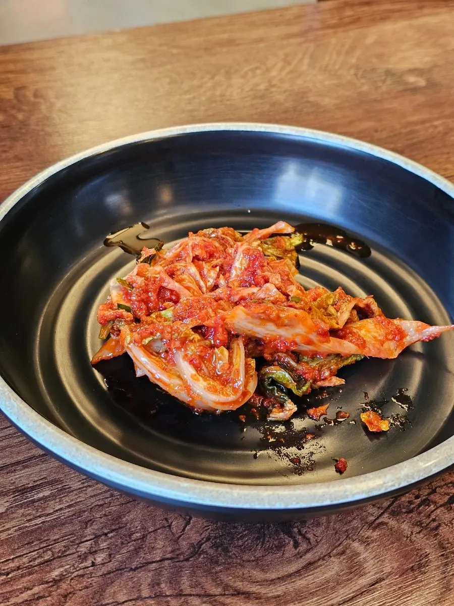 Extra napa cabbage kimchi taken from the self-serve corner