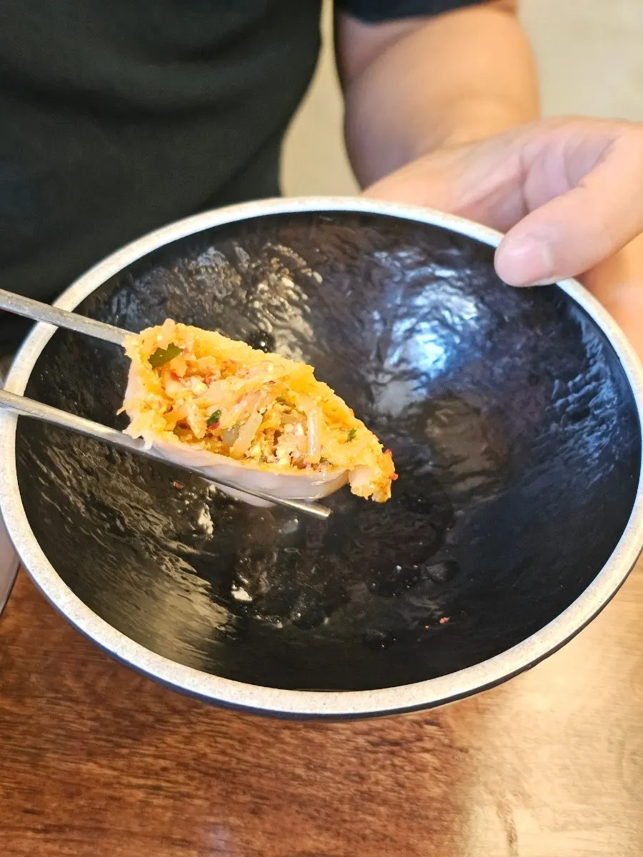 Dumpling filling packed with meat and kimchi