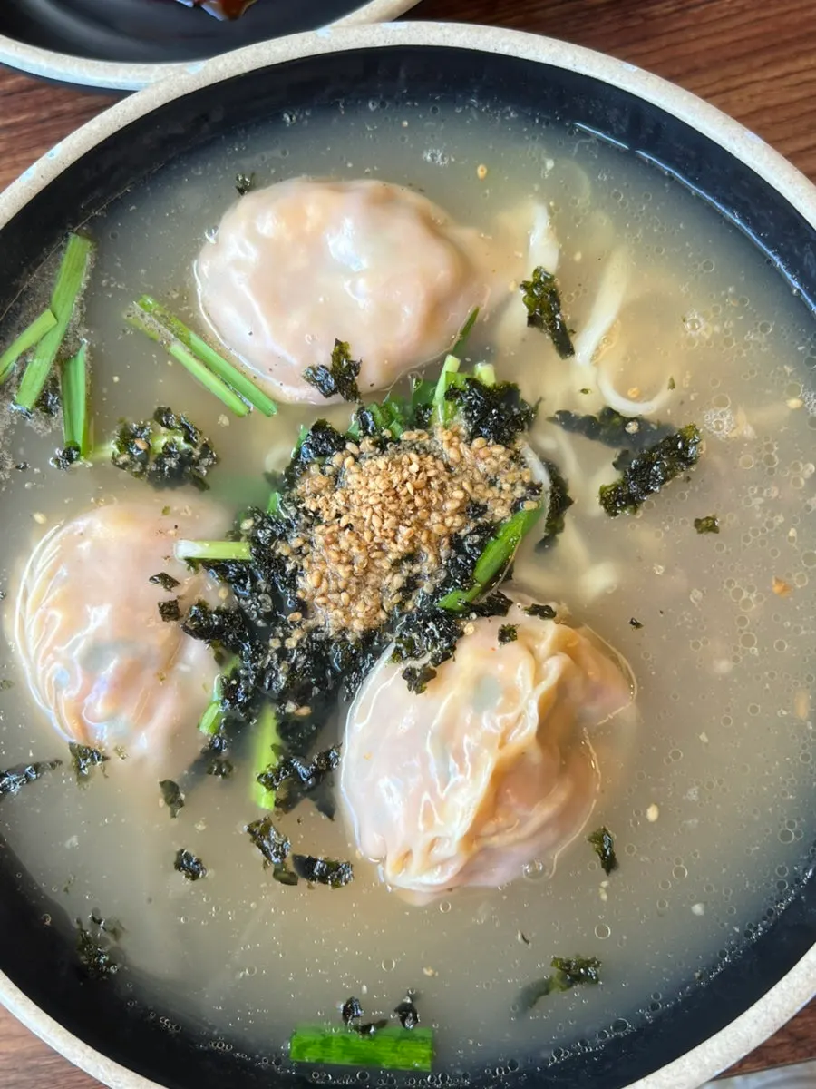 Bowl of kong-kalguksu with pale soybean broth