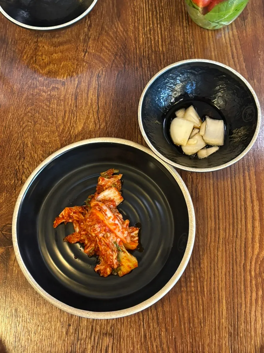 Basic side dishes of kimchi and pickled onions