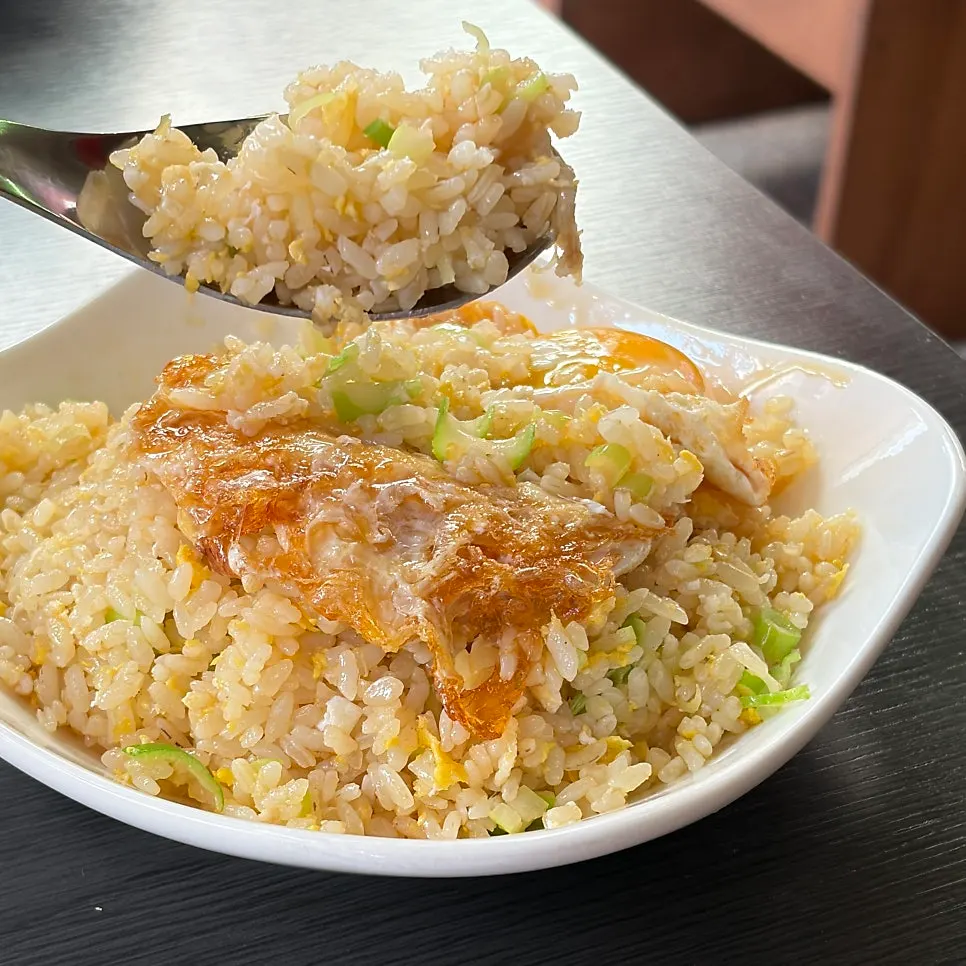 Biryong egg fried rice topped with a fried egg