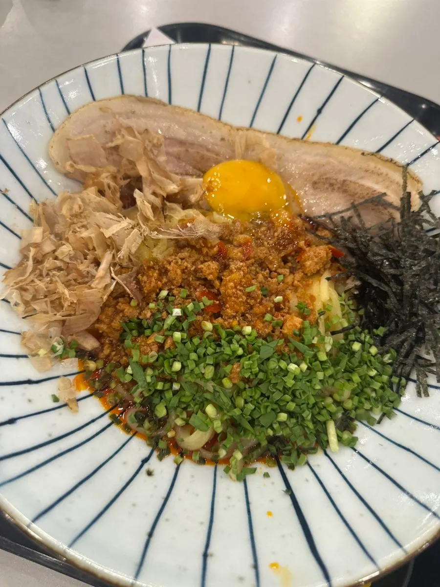 Mazesoba topped with whole pork belly