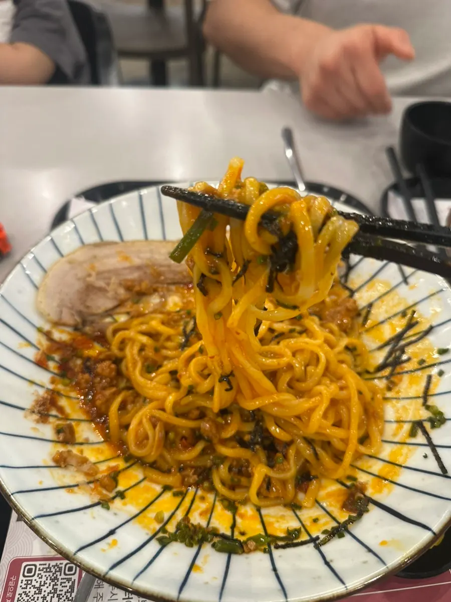 Mazesoba mixed with egg yolk and sauce