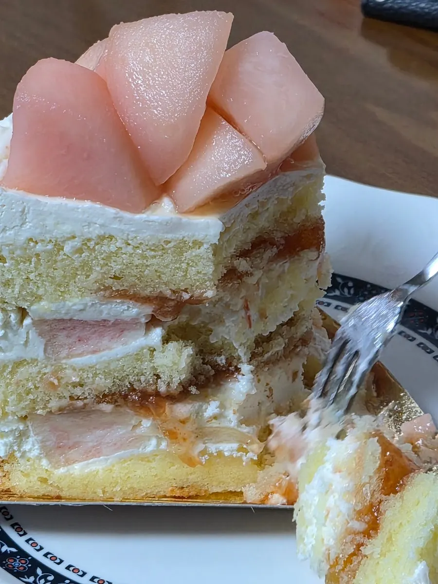 Yogurt cake topped with stewed peaches
