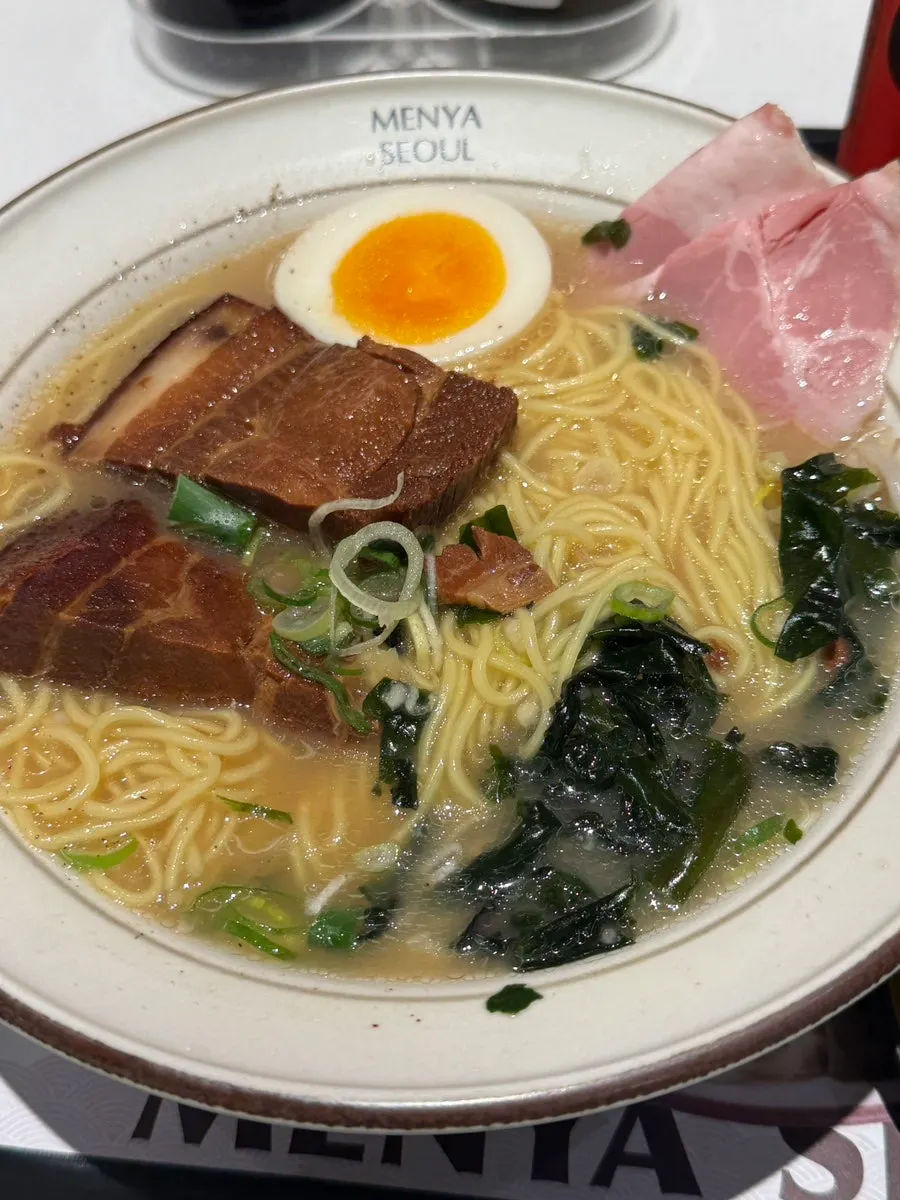 Ramen topped with two pieces of dongpo pork