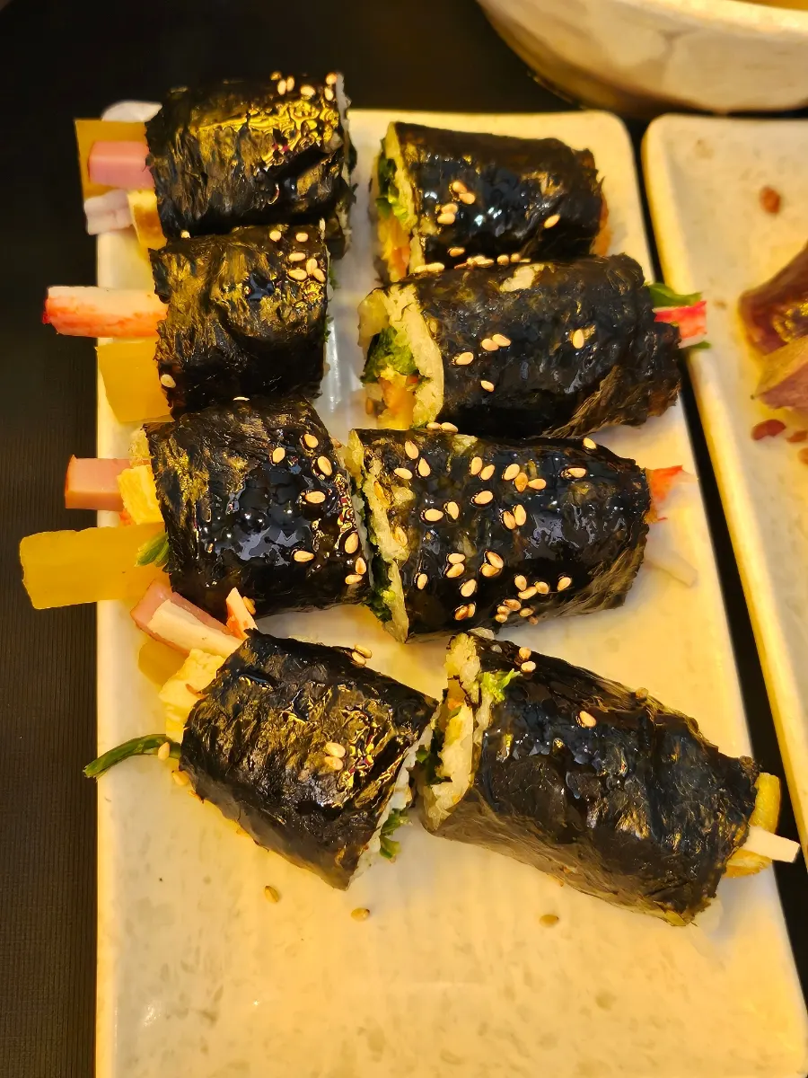 Four mini gimbap packed with fillings