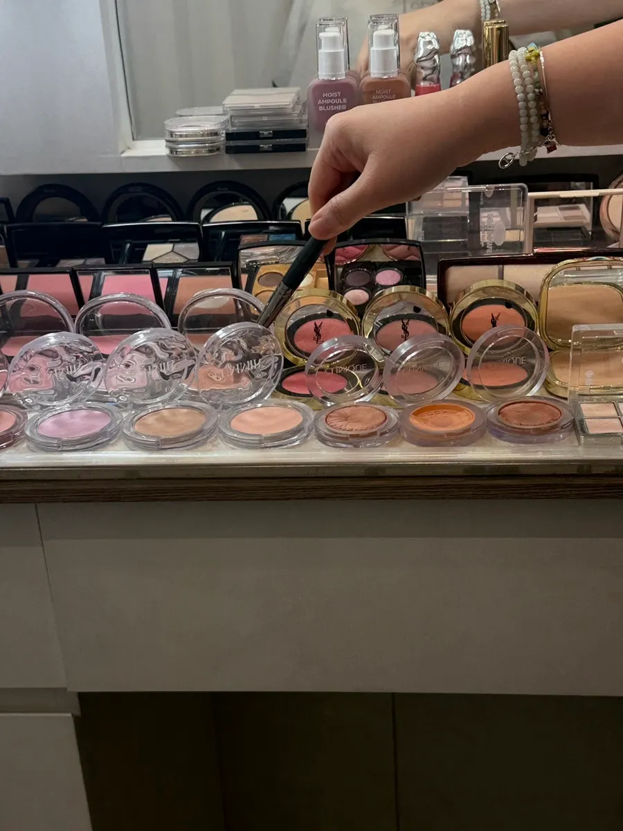 Makeup application for a photo shoot
