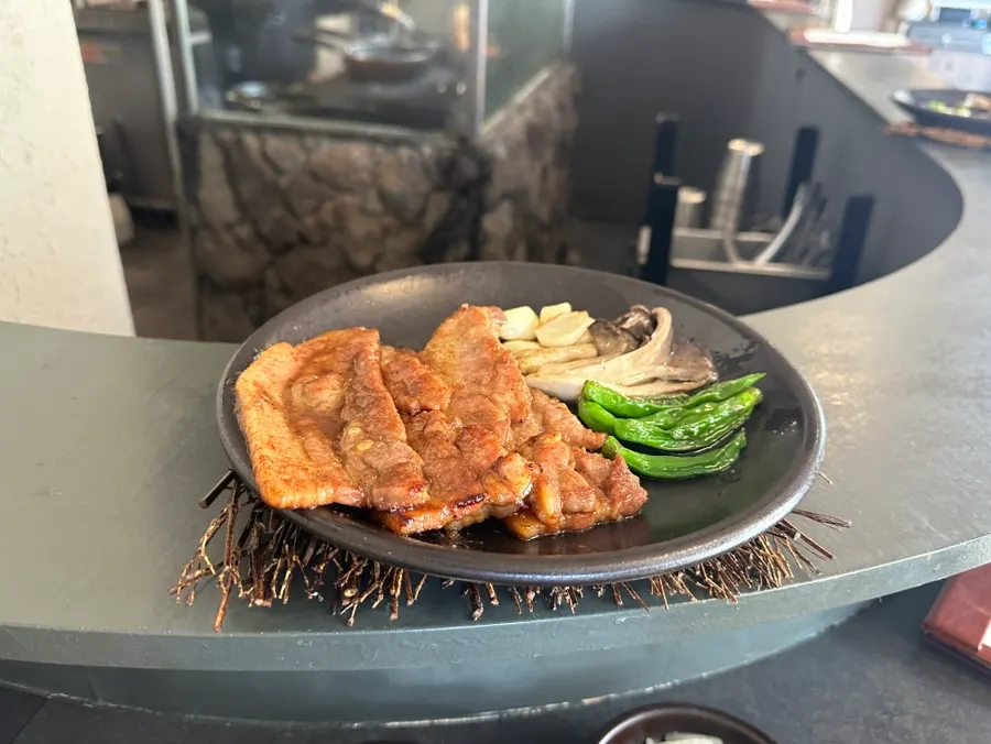 Side dishes served in ceramic bowls