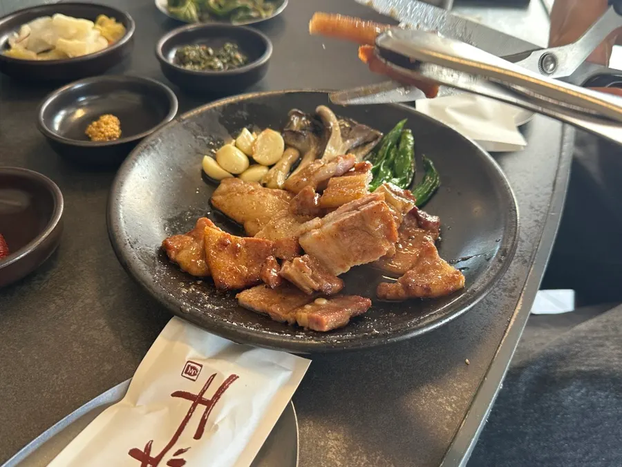 Initially grilled fermented pork belly
