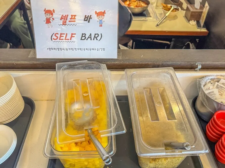 Menu board showing sets and instant tteokbokki options