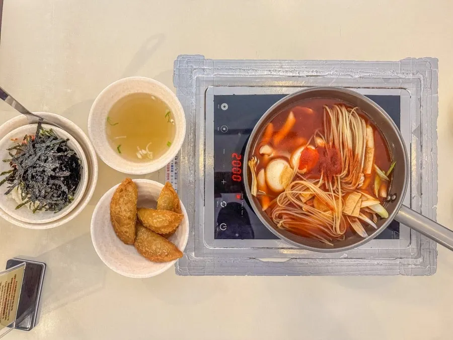 Plate of fried batter flakes from the self-serve bar with Coolpis soda