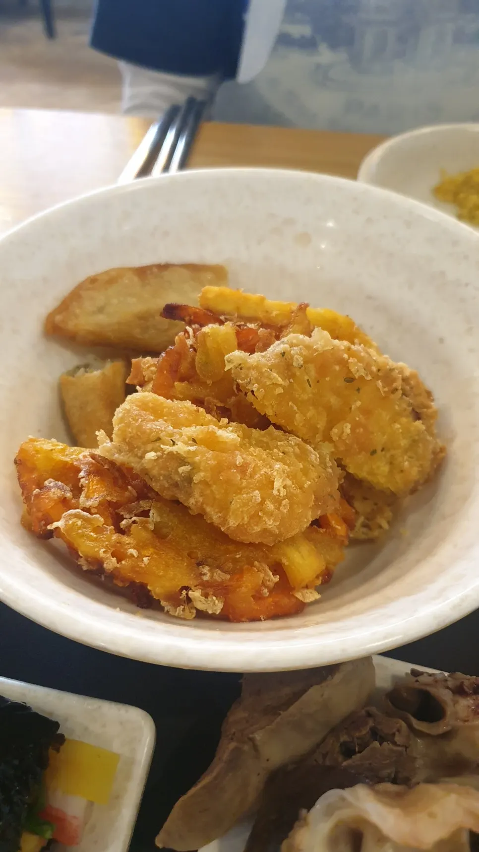 Assorted fritters with sweet potato, vegetable, mandu, gimmari, and squid