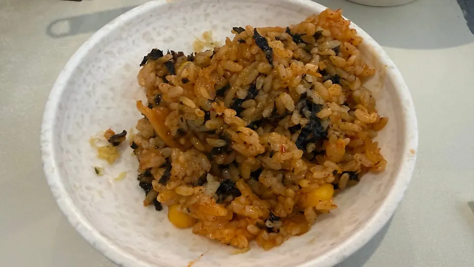 Fried rice pressed flat and finished on the burner