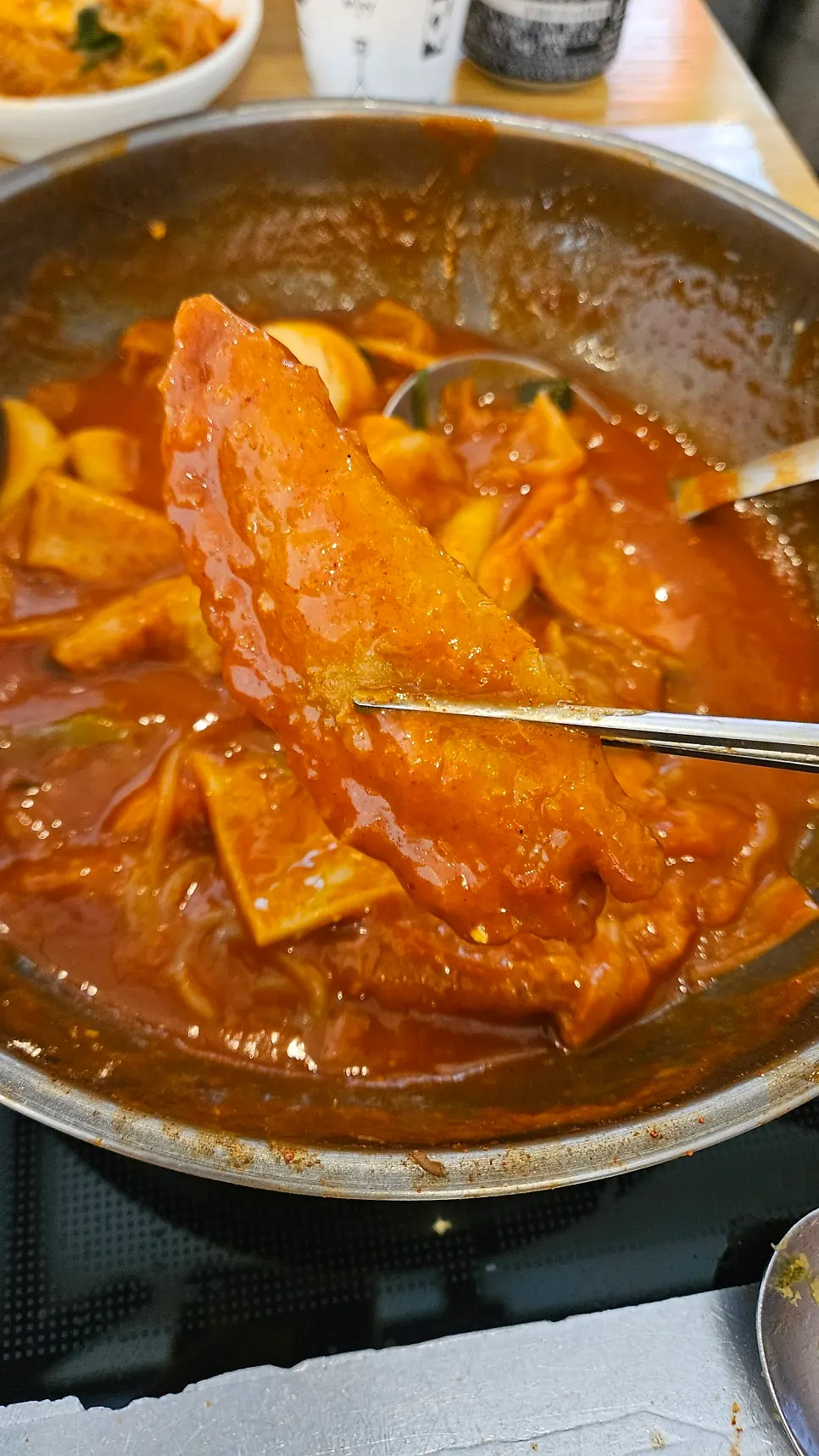Yaki mandu soaked in tteokbokki sauce
