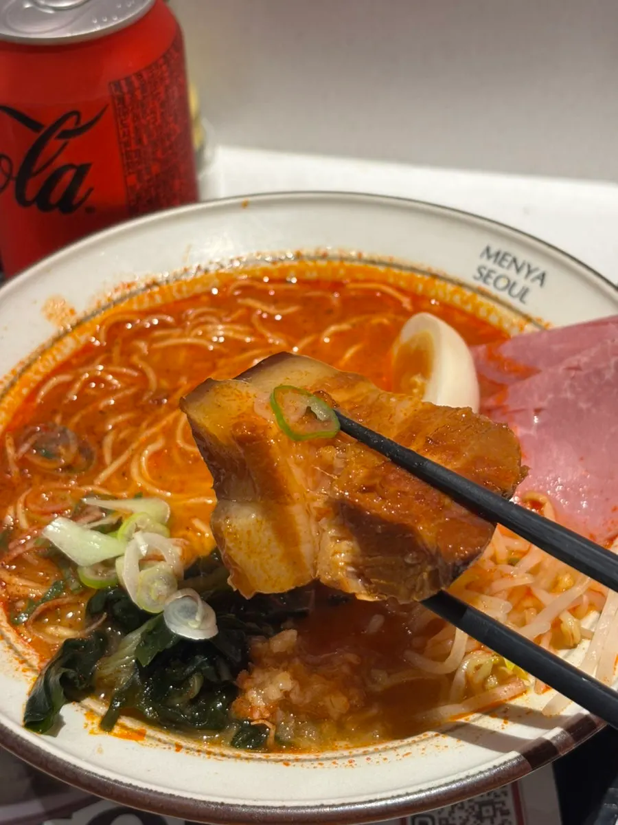 Dongpo pork chashu on top of the spicy broth ramen