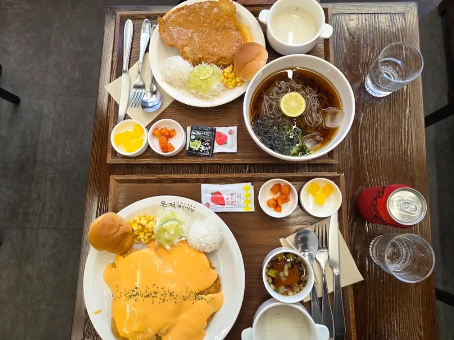 Table with two orders of pork cutlet placed on it