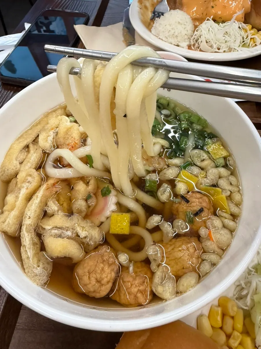 Final table spread enjoying pork cutlet with udon together