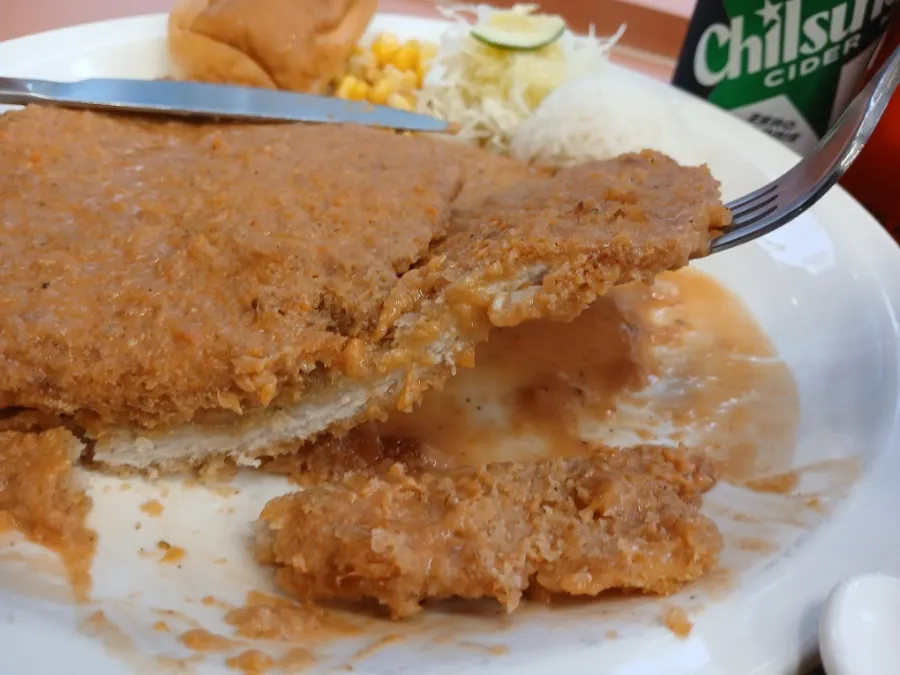 Cross-section of the thin, crispy Western-style cutlet