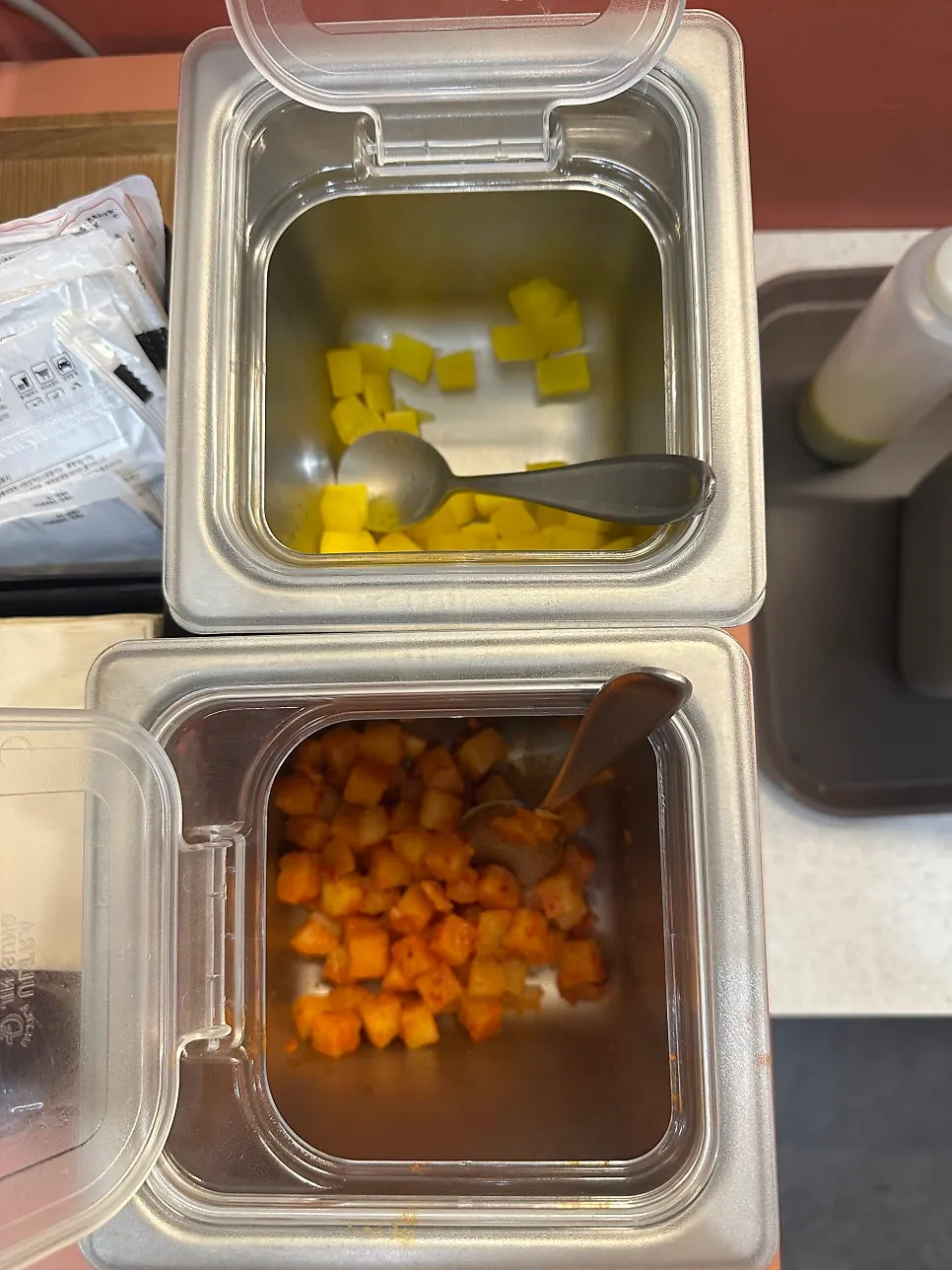 Salad greens and dressing at the self bar