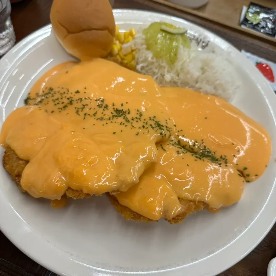 Cross-section of the cheddar cheese cutlet with melted cheese