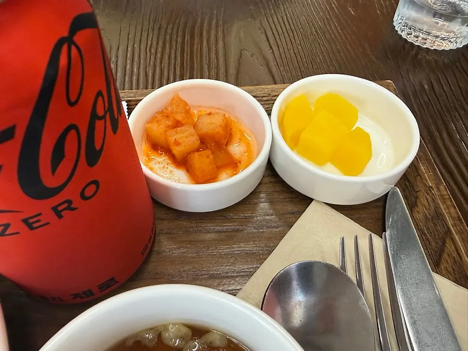 Diced radish kimchi, pickled radish, and doenjang soup side dishes