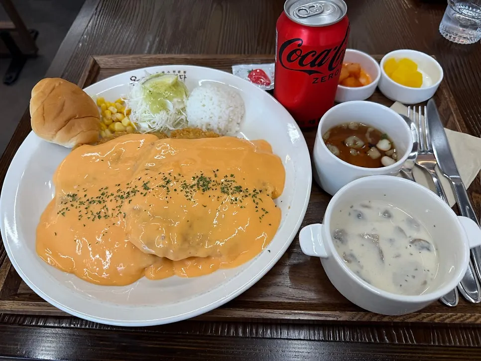 A full lunch spread served with the pork cutlet