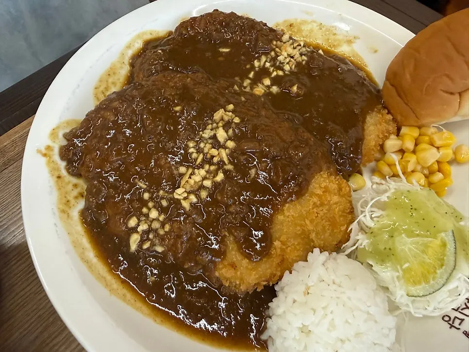 Curry pork cutlet generously topped with curry sauce