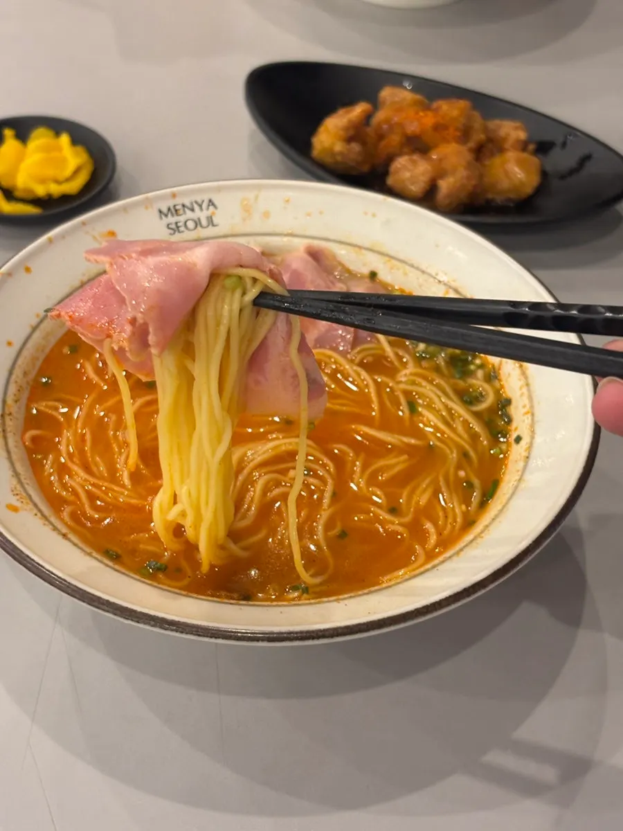 Ramen with spicy broth and jambon topping