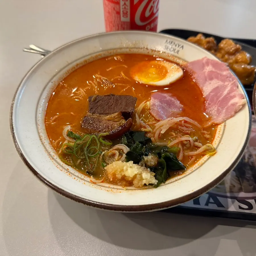 A bowl of spicy dongpo pork chashu ramen