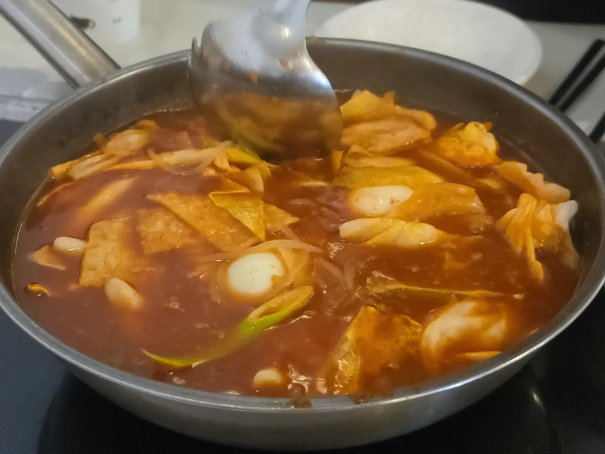 Pot of instant tteokbokki with the broth reduced down