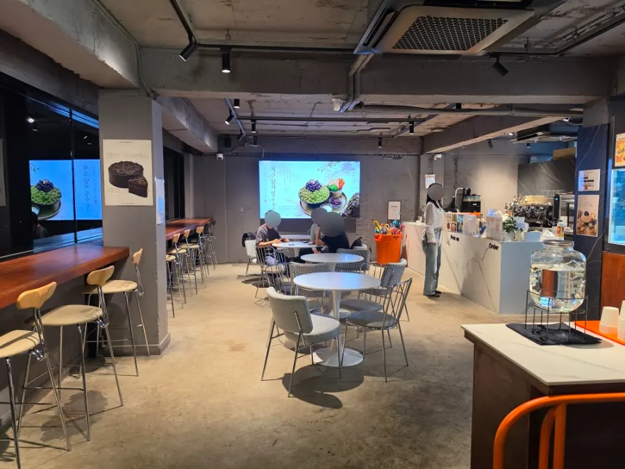 Interior of the 2nd-floor bakery café at HYBE Playground