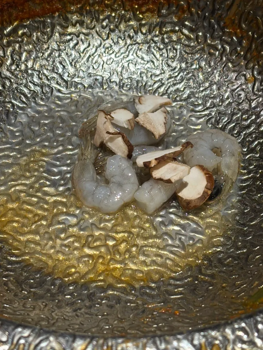 Shabu-shabu with panda-shaped rice cakes