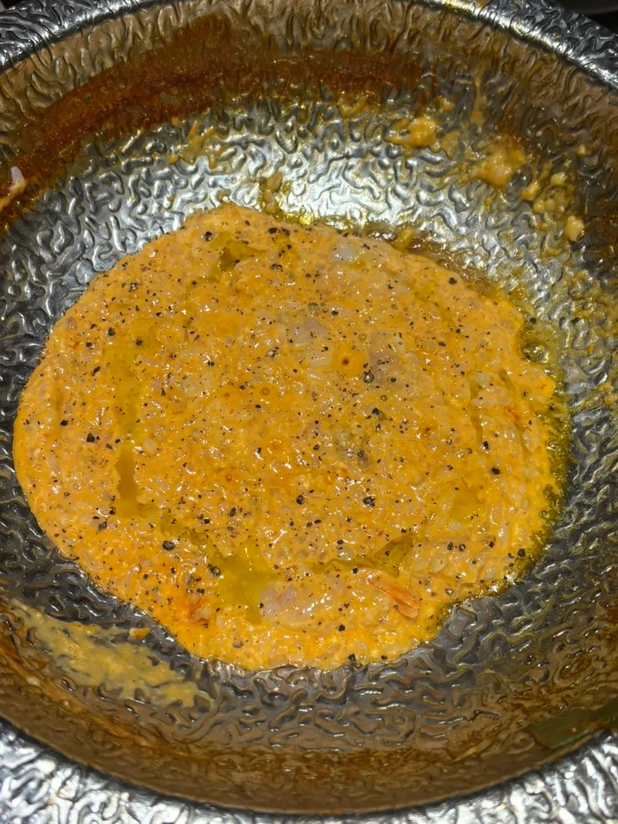 Rosé risotto finished with nutty oil