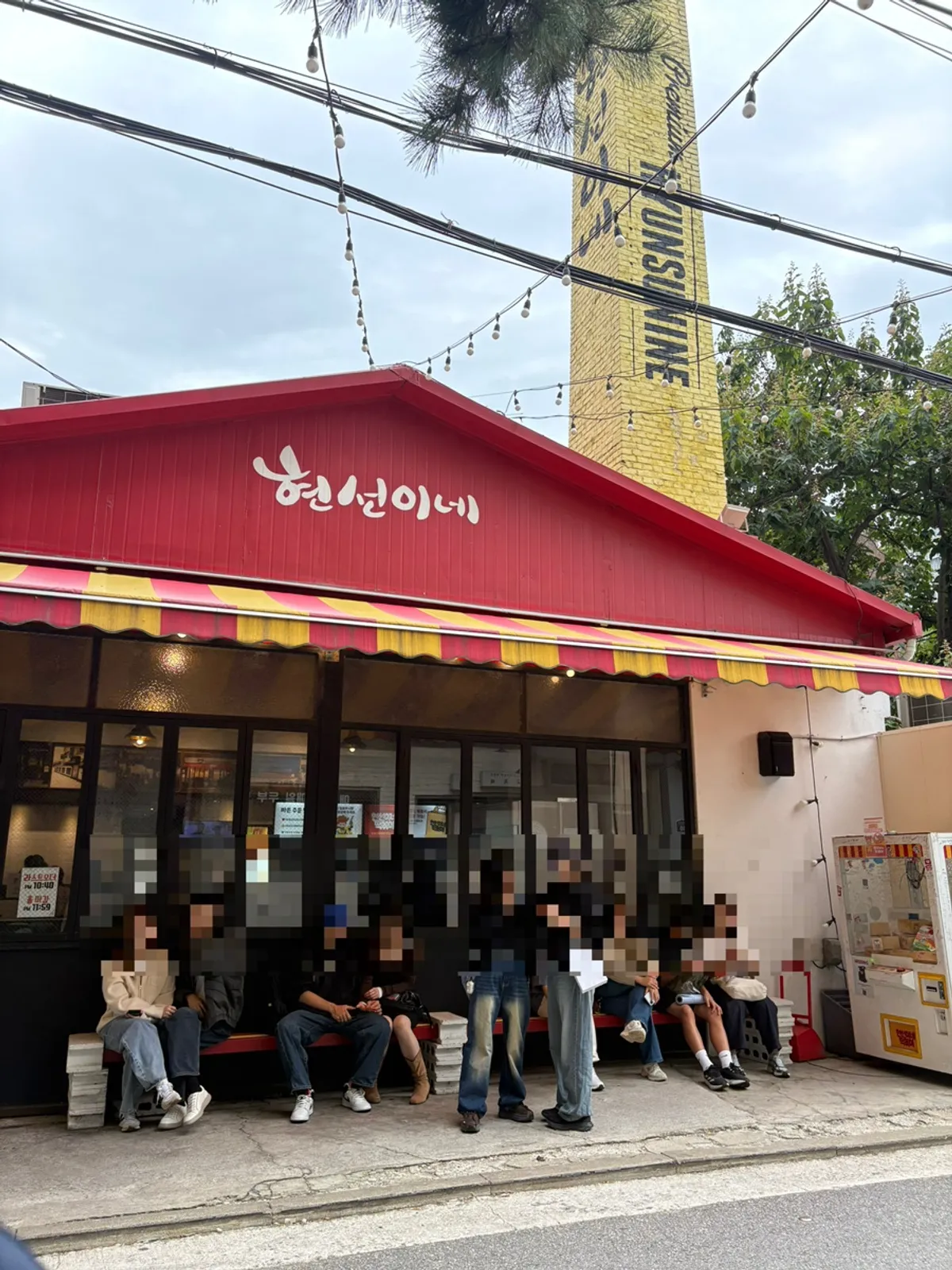 Red Hyeonseonine exterior with a street-stall feel