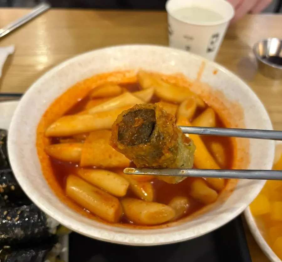Assorted fritters served with tteokbokki broth