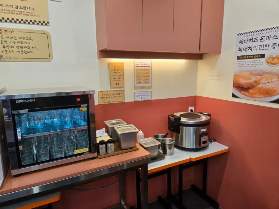 Self-service bar with rice and side dishes