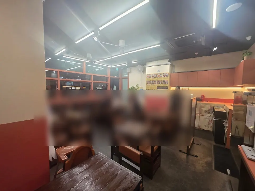 Restaurant interior in coral and beige tones
