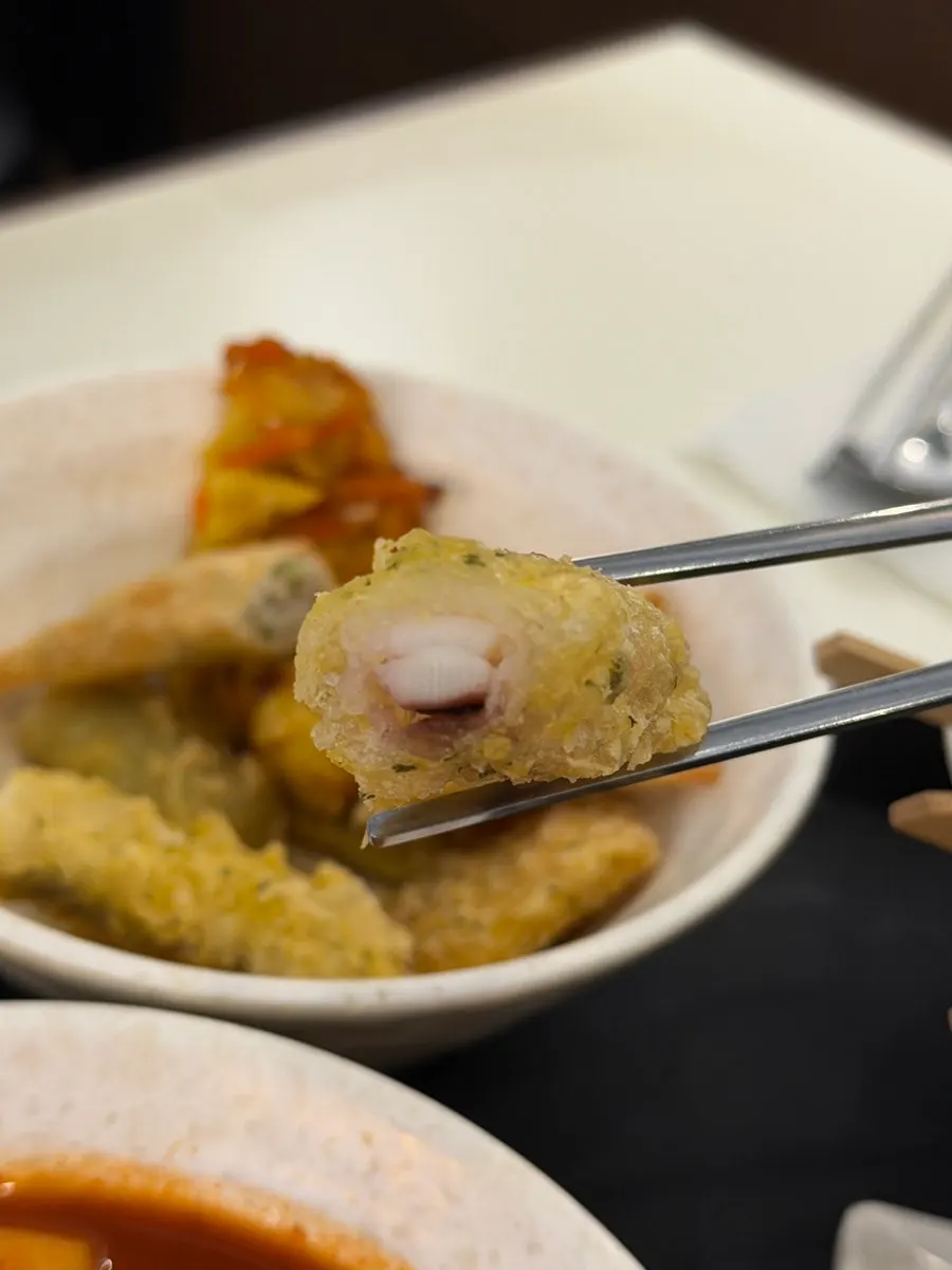 Assorted fritters including vegetable fritters and gim-mari