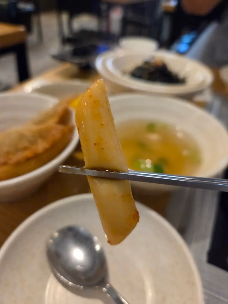 Rice cakes coated in sauce