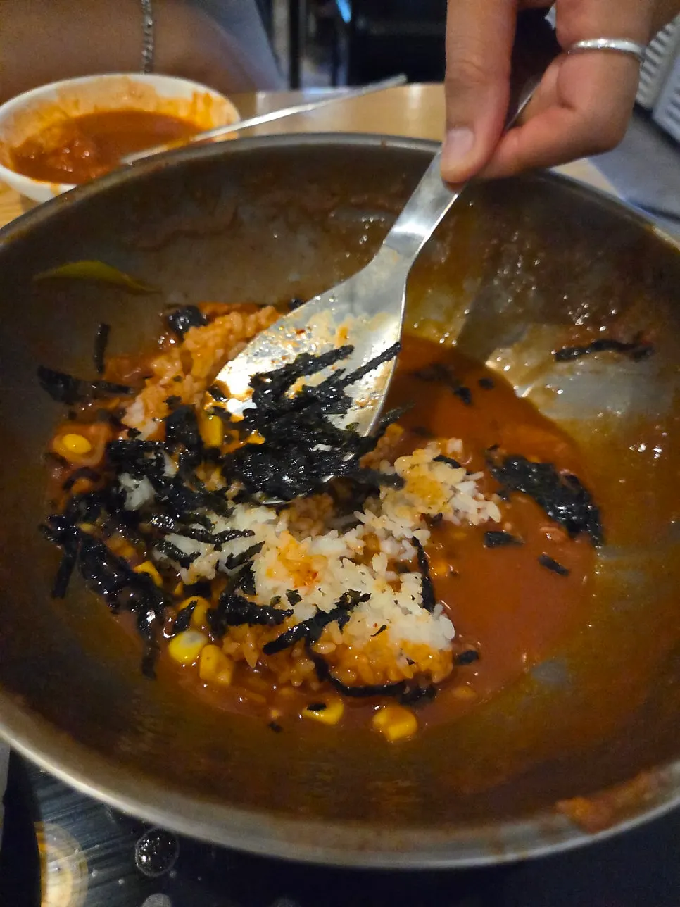 Pot with remaining rice cakes and bits