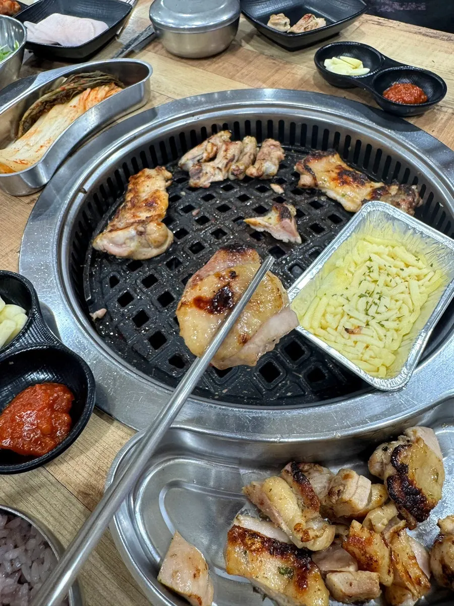Chicken barbecue paired with side dishes