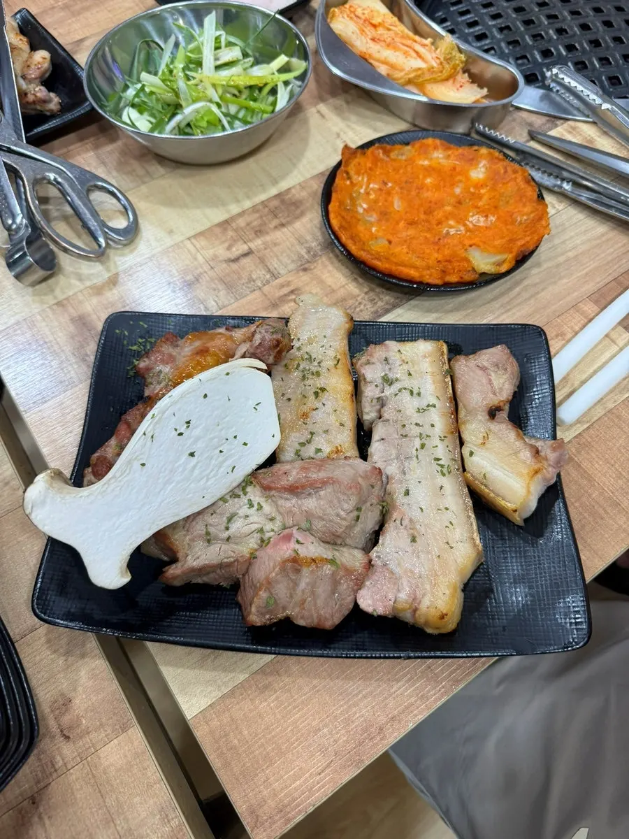 Partially grilled charcoal pork platter